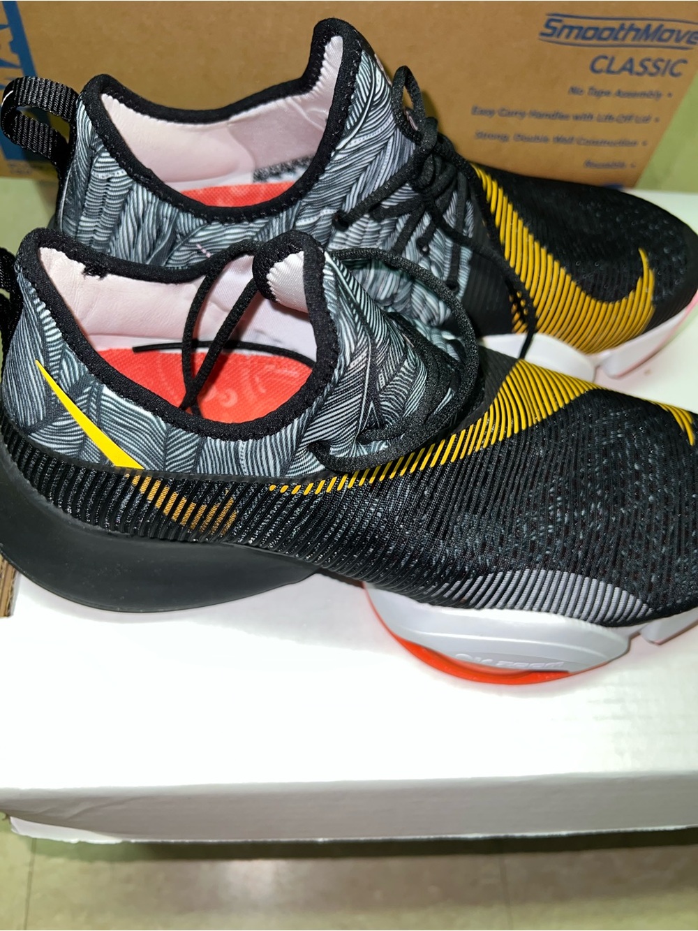 Nike Women's Black and Yellow Patterned Athletic Sneakers